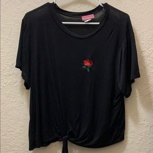 Tie up black crop top with a little rose